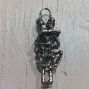 Silver Intertwined Skeleton Pendant